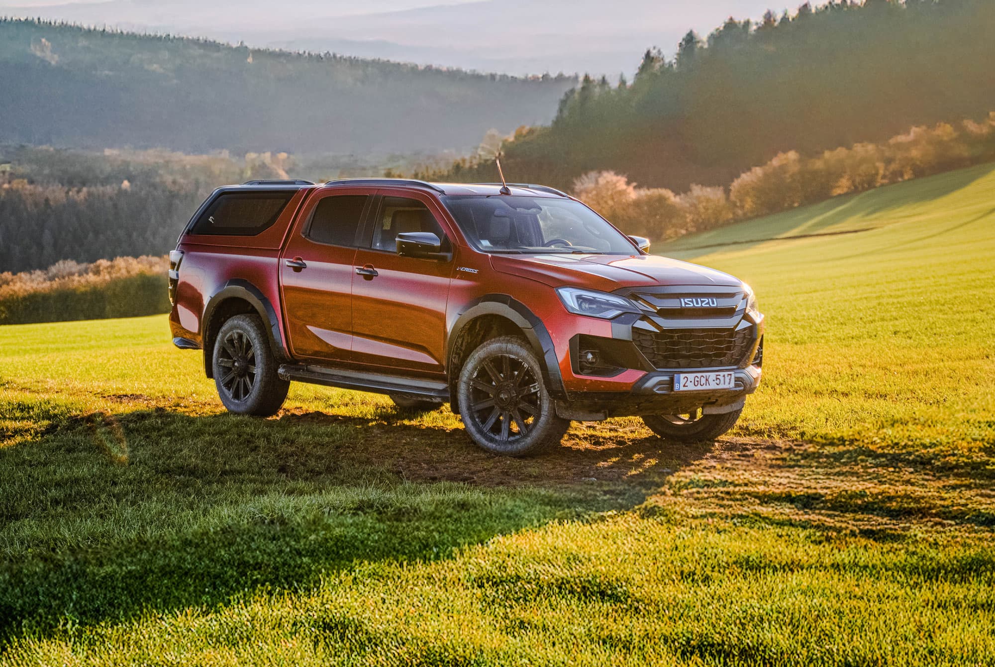 Isuzu D-Max Double Cab hardtop in a field