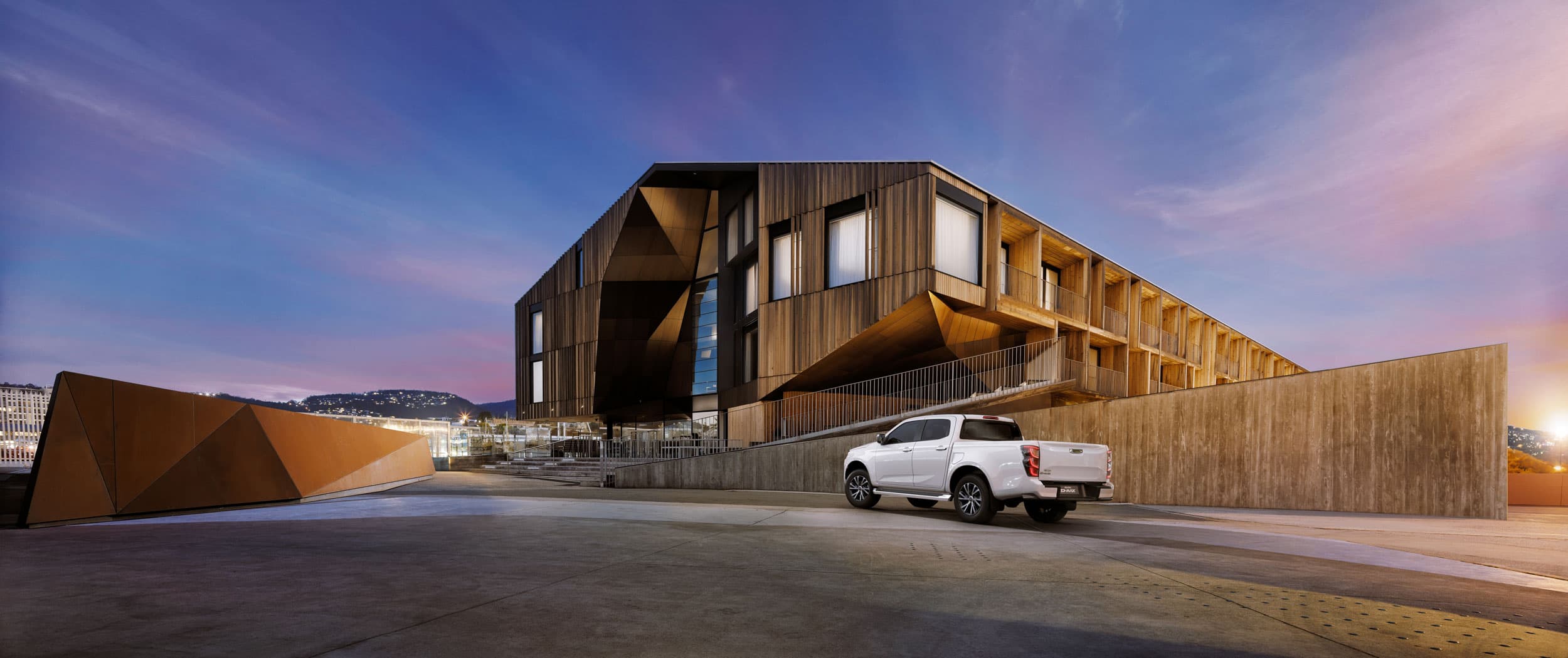 side back view next to hotel alone